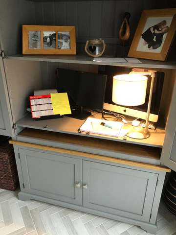 Home office wall cabinet with a hidden surprise inside
